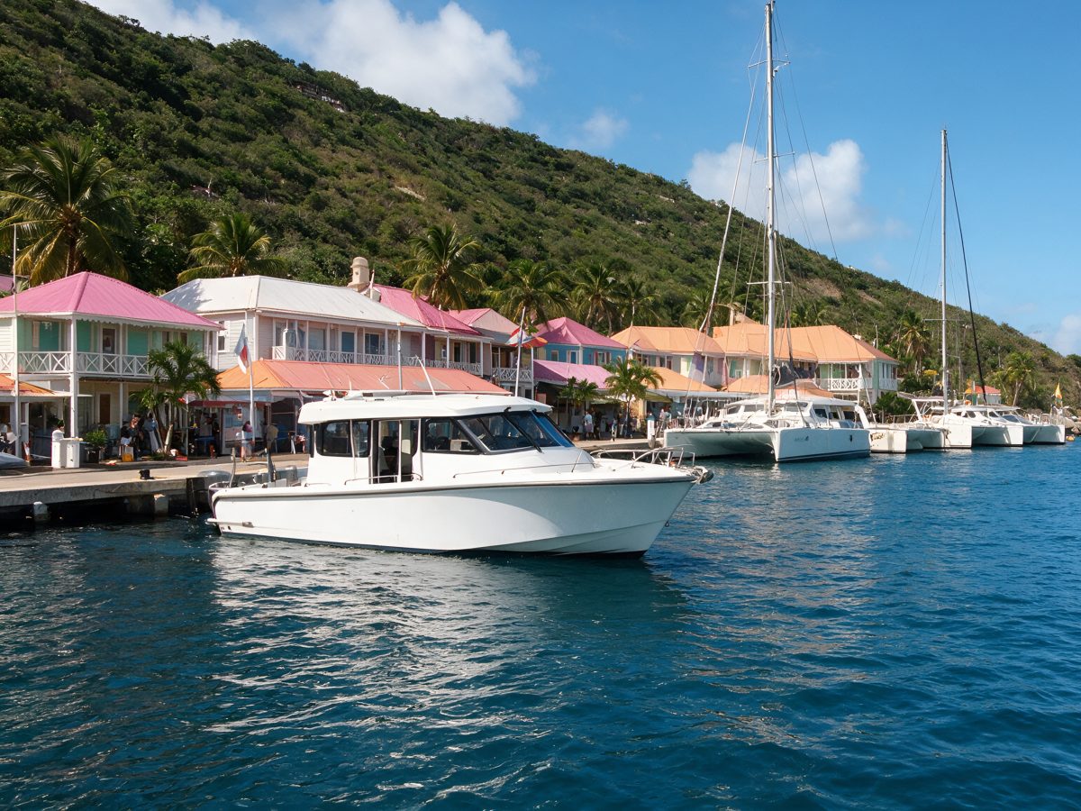 Water taxi tied up at the colourful Soper's Hole waterfront, West End, Tortola, BVI